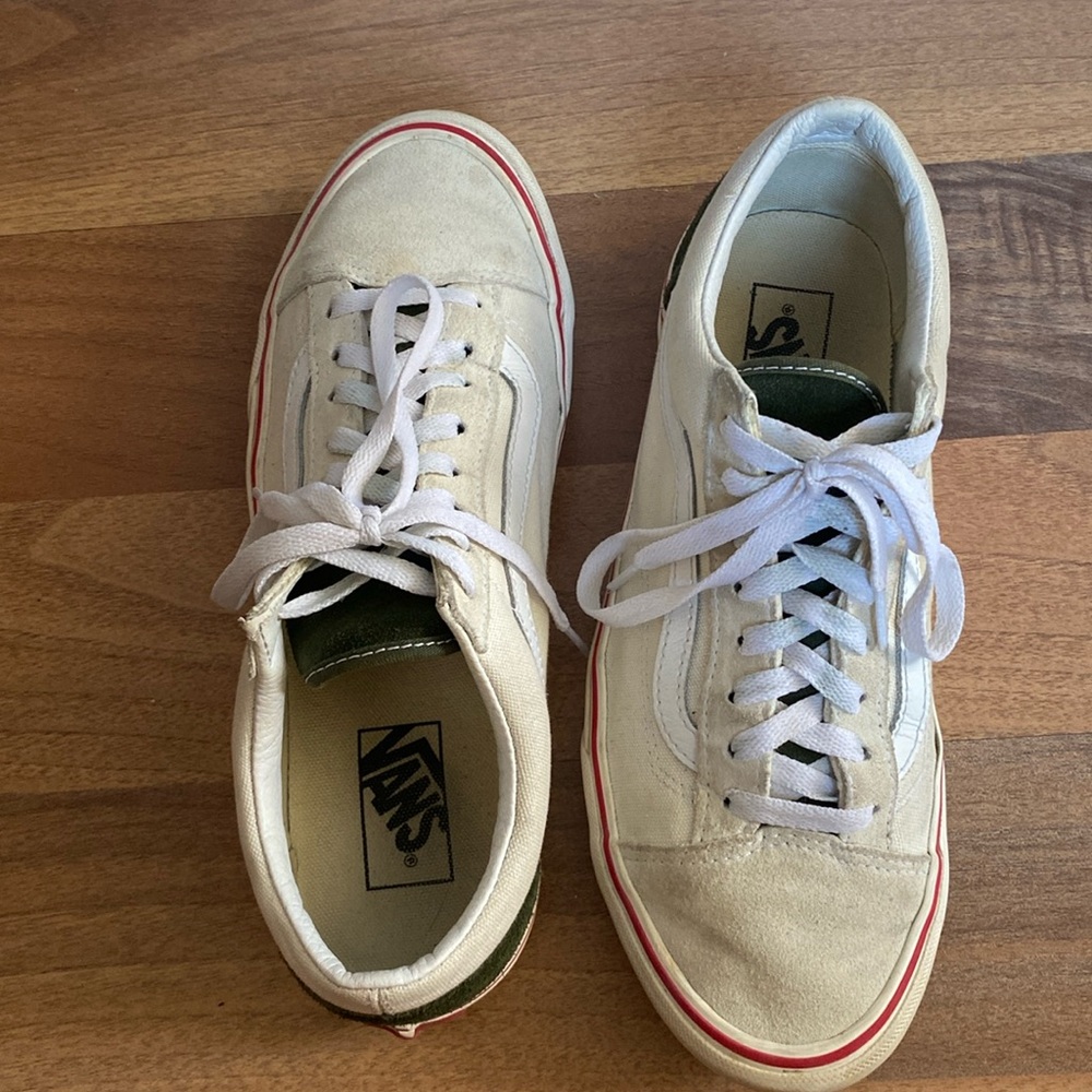 Cream colored canvas vans with green suede accents and red stripe